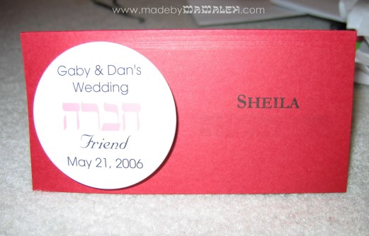 Rehearsal dinner placecard with detachable hebrew button